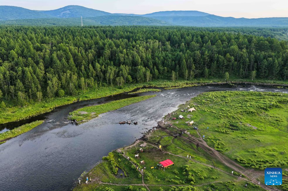 An aerial drone photo taken on July 28, 2026 shows a view of the Arxan National Forest Park in Arxan of Hinggan League, north China's Inner Mongolia Autonomous Region. (Xinhua/Li Zhipeng)