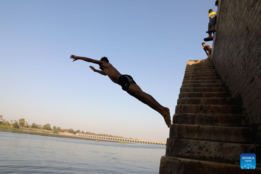 A man jumps into the Nile River to escape the heat in Cairo, Egypt, Aug. 3, 2026. (Xinhua/Ahmed Gomaa)
