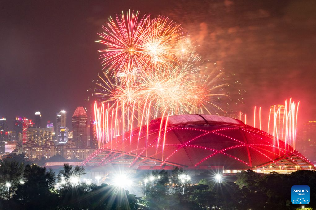 Fireworks light up the sky over Kallang Basin during the National Day celebrations in Singapore on Aug. 9, 2026.

Singapore celebrated the 61st anniversary of its independence on Sunday. (Xinhua/Then Chih Wey)