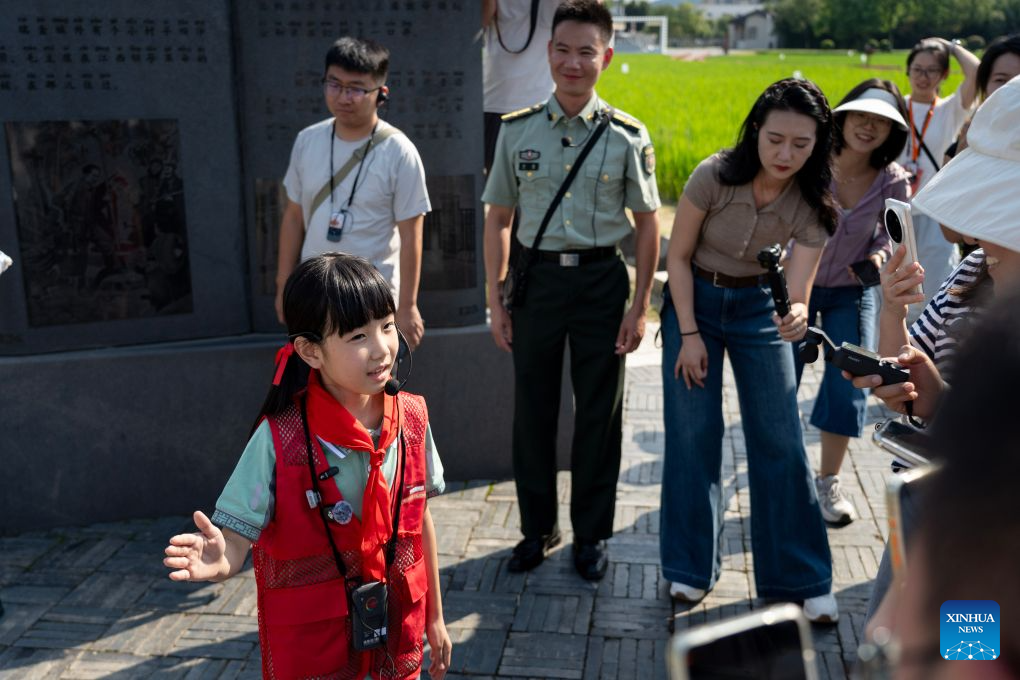 A child narrator introduces the history of the Hongjing revolutionary site in Ruijin, east China's Jiangxi Province, Sept. 9, 2026. This year marks the 90th anniversary of the victory of the Long March by the Red Army under the leadership of the Communist Party of China (CPC). Ruijin is a landmark in the Long March, the historic military maneuver in modern Chinese history. (Xinhua/Cao Mengyao)