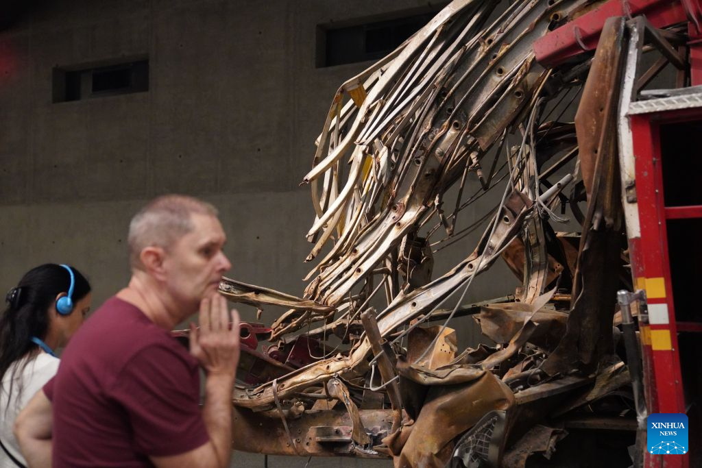 People view an exhibit at the National September 11 Memorial & Museum in New York, the United States, on Aug. 31, 2026. A preview of an exhibition marking the 25th anniversary of the 9/11 attacks was held here on Monday. (Xinhua/Zhang Fengguo)