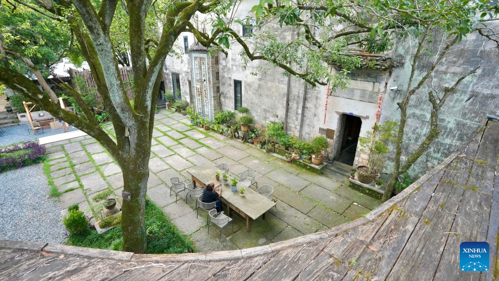 This photo taken on Aug. 26, 2026 shows a view inside a homestay in Wuyuan County, east China's Jiangxi Province.
Wuyuan County is known for its picturesque countryside and well-preserved traditional villages.
With two national 5A-rated tourist attractions and 12 national 4A-rated attractions, the county has been promoting rural tourism and creating more employment opportunities for local residents through tourism-related employment and entrepreneurship.
Today, Wuyuan is home to more than 1,300 rural homestays, while the tourism industry directly supports more than 80,000 jobs. (Xinhua/Hu Chenhuan)
