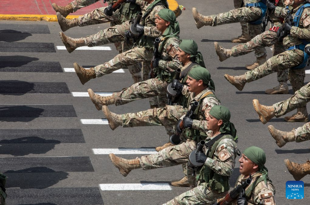 Soldiers participate in a parade to commemorate the 205th anniversary of Peru's independence in Lima, Peru, July 29, 2026. (Photo by Mariana Bazo/Xinhua)