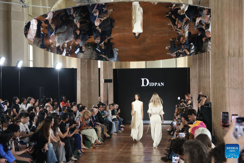 Models present creations of IDPAN at Shenzhen Futian Fashion Event in Milan, Italy, Sept. 22, 2026. Three Chinese brands Laurèl, IDPAN and YINER held a joint fashion show during the Spring/Summer 2027 Milan Fashion Week on Tuesday. (Photo by Michele Novaga/Xinhua)