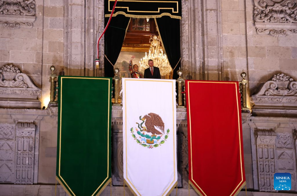 Mexican President Claudia Sheinbaum (L) and her husband attend celebrations for the upcoming Independence Day in Mexico City, Mexico, Sept. 15, 2026. Various celebrations were held in Mexico to welcome the country's annual Independence Day, which falls on Sept. 16. (Xinhua/Liu Wenhui)