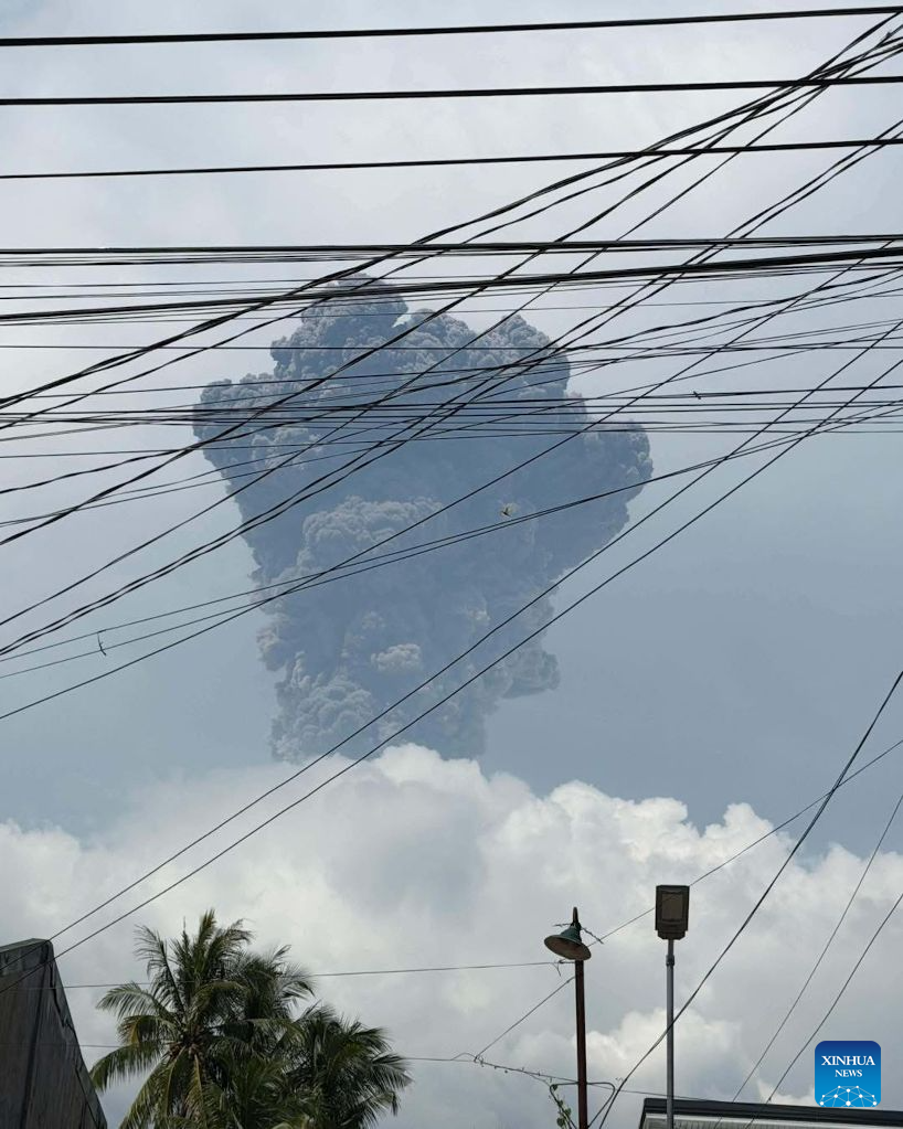A thick plume is seen over the sky as Mount Kanlaon Volcano erupts in Negros Island, the Philippines, on Oct. 10, 2026. Mount Kanlaon Volcano in the central Philippines erupted just over noon Saturday, the Philippine Institute of Volcanology and Seismology said. The institute said the event generated a plume that rose 5 km to 6 km above the crater. The ashfall is expected to drift north and northeast. (National Disaster Risk Reduction and Management Council/Handout via Xinhua)