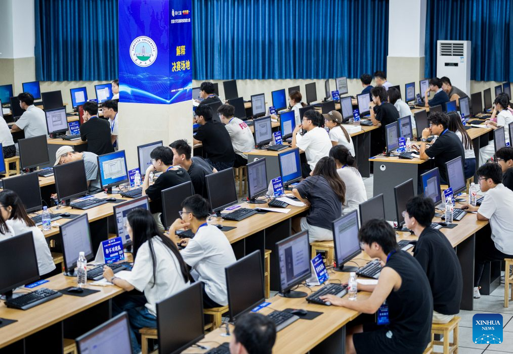 Contestants take part in the National Exploration Geophysics Competition for College Students at Yangtze University in Jingzhou City, central China's Hubei Province, Aug. 26, 2026. The competition kicked off here on Wednesday, with 148 teams from 32 colleges competing in software development and application. (Xinhua/Xiao Yijiu)