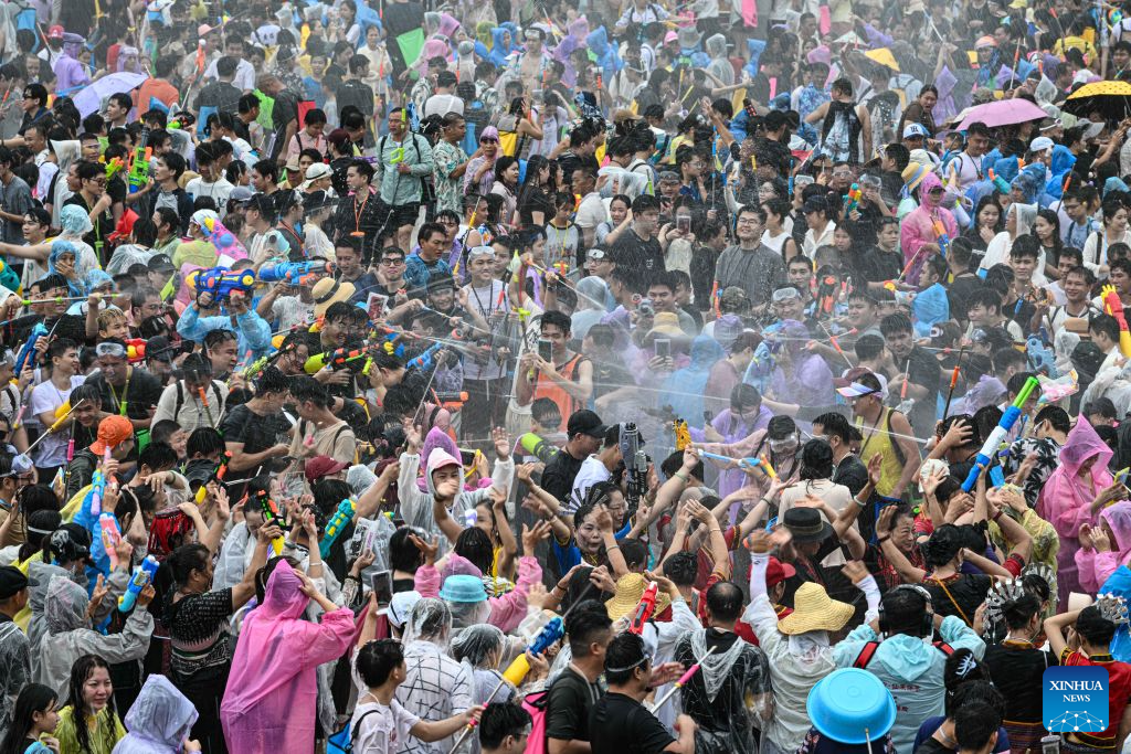 People attend a water festival held in Baoting Li and Miao Autonomous County, south China's Hainan Province, Aug. 19, 2026.
A water festival is held here on Wednesday, on the occasion of the Qixi Festival, the Chinese version of the Valentine's Day. (Xinhua/Pu Xiaoxu)