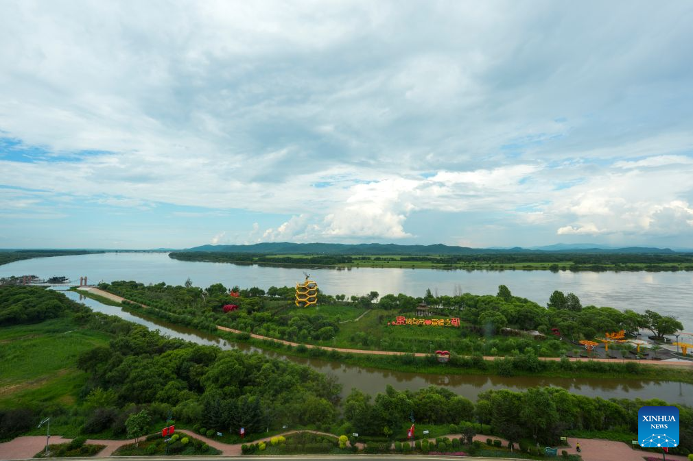 This photo taken on July 22, 2026 shows a view of black honeybee themed park along the Wusuli River in Raohe County, northeast China's Heilongjiang Province.(Xinhua/Wang Song)