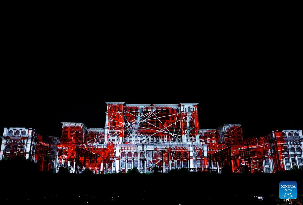 A 3D projection is seen during the iMapp Bucharest 2026, on the facade of the Parliament Palace, in Bucharest, Romania, Sept. 19, 2026. (Photo by Cristian Cristel/Xinhua)
