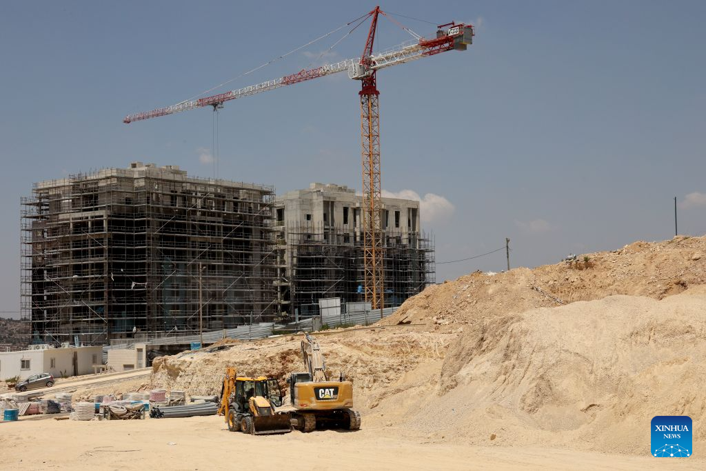 This photo taken on Aug. 9, 2026 shows an Israeli settlement under construction in the West Bank, near Jerusalem. In recent years, Israel's continued approval of settlement expansions in the region has drawn widespread criticism from the international community. (Photo by Gil Cohen Magen/Xinhua)