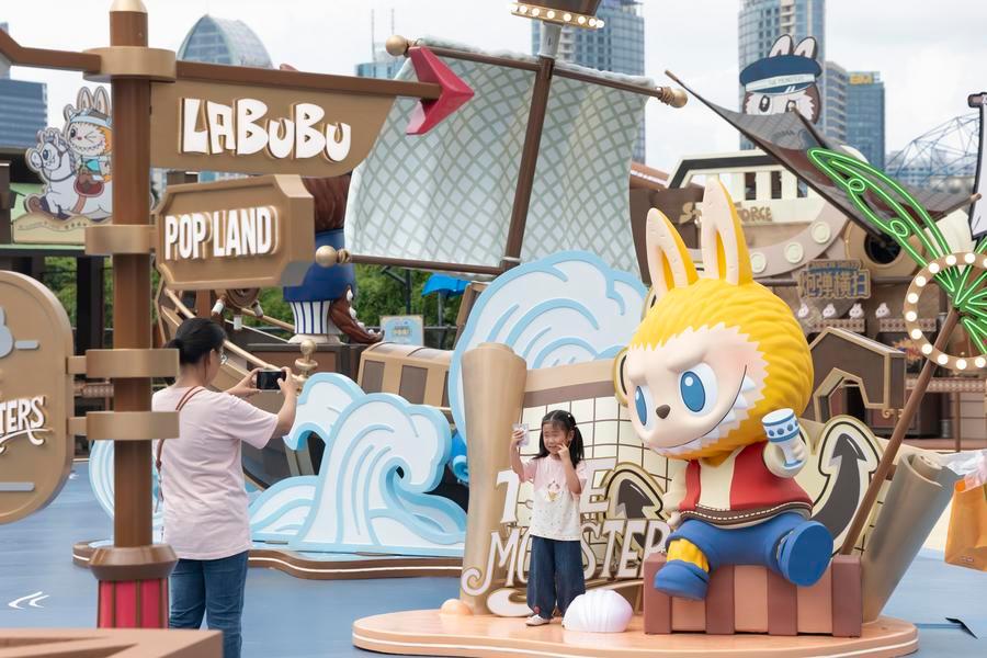People visit a touring exhibition launched by Pop Mart at the Oriental Pearl Tower in east China's Shanghai, Sept. 3, 2026. (Xinhua/Wang Xiang)