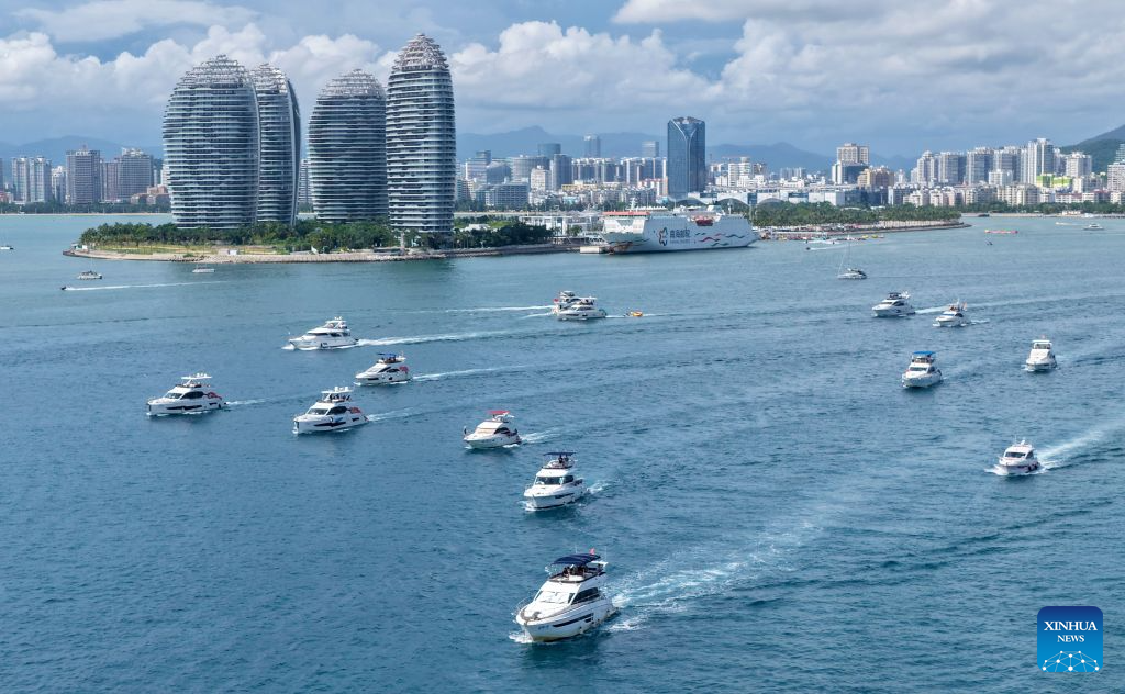 An aerial drone photo taken on Aug. 4, 2026 shows tourists taking yachts in Sanya, south China's Hainan Province. Hainan is stepping up with efforts to build a world-class destination for international tourism and consumption as a key component of the Hainan Free Trade Port, and to probe for a new path towards high-quality development in its tourism-led consumer economy with distinctive local characteristics.
Hainan is projected to annually receive 154 million counts of domestic and international visits by 2030, along with tourism-related revenue of 363 billion yuan (about 53.83 billion U.S. dollars). (Xinhua/Zhao Yingquan)