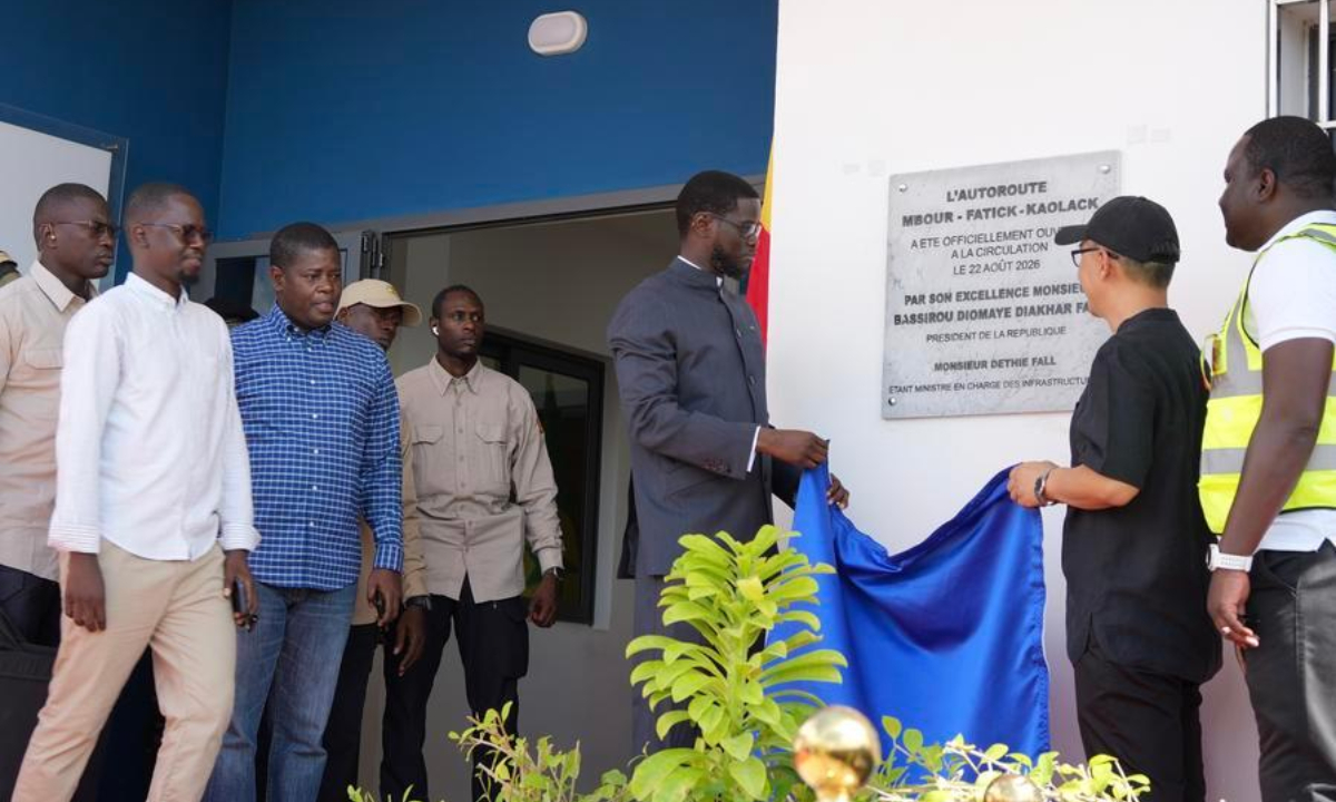 Senegalese President Bassirou Diomaye Faye (3rd R) unveils a plaque of the Mbour-Kaolack highway project in Thiadiaye, Mbour Department, in Senegal's western Thies Region, Aug. 22, 2026. (Xinhua/Qi Qi)
