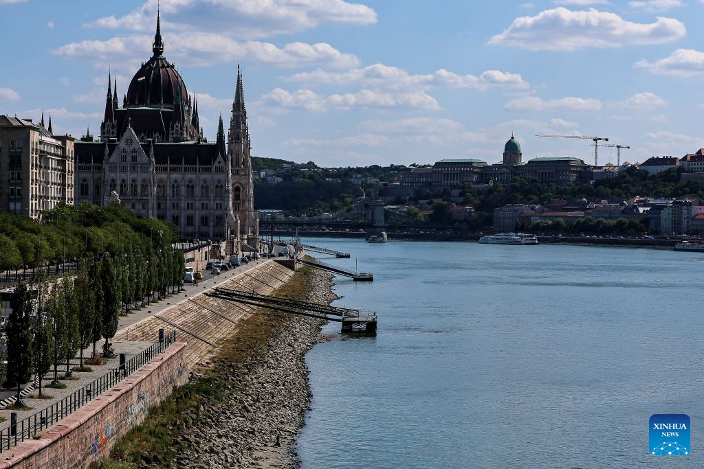 Photo taken on July 28, 2026 shows the Danube River with its partially exposed riverbed in Budapest, Hungary. The water level of the Danube River in Budapest fell to a record low of 31 centimeters on Tuesday, according to Hungary's General Directorate of Water Management. The reading surpassed the previous record low of 33 centimeters which was measured on October 25, 2018, as prolonged drought and a lack of rainfall continue to affect much of the region. (Photo by David Balogh/Xinhua)