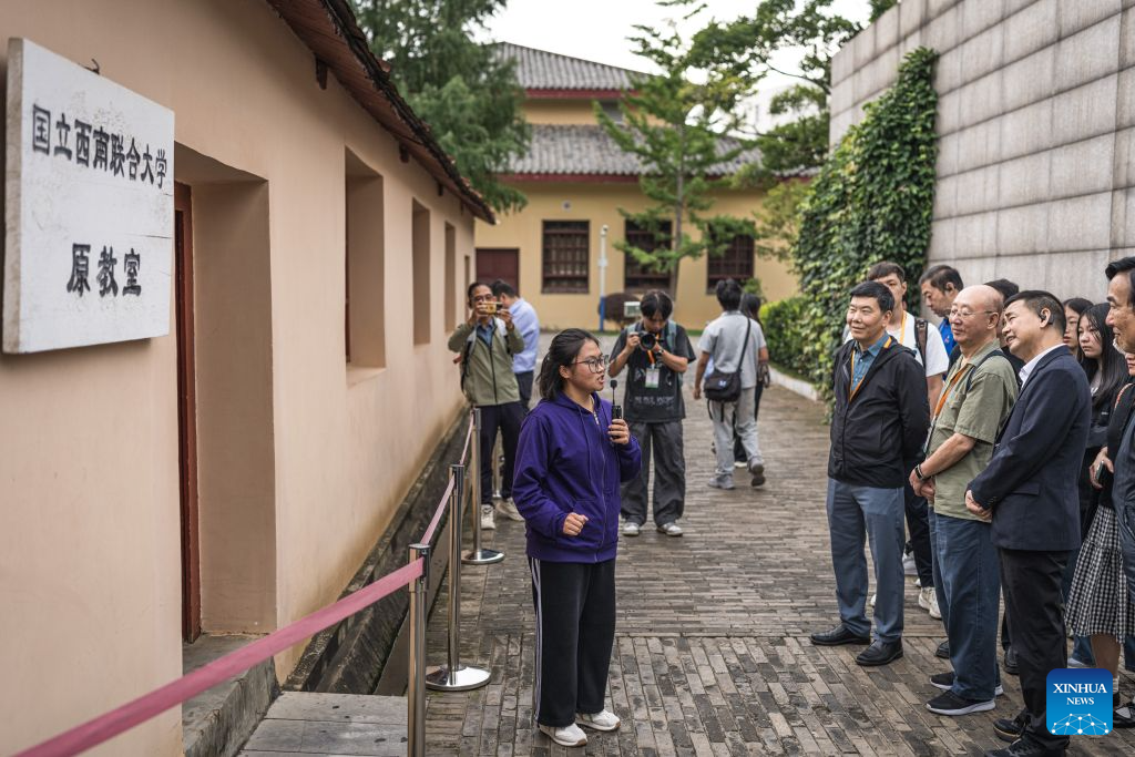 Members of a Macao media delegation visit the former site of the National Southwest Associated University at Yunnan Normal University in Kunming, southwest China's Yunnan Province, Aug. 22, 2026.
The Macao media delegation is on a visit to Kunming, Dali, and Lijiang in Yunnan Province from Aug. 21 to 27. The visit aims to strengthen exchanges and cooperation between Yunnan and Macao media. (Xinhua/Wang Guansen)