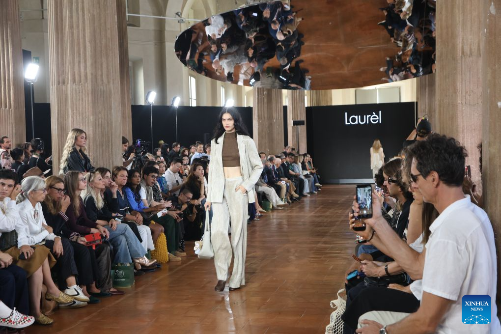 Models present creations of Laurèl at Shenzhen Futian Fashion Event in Milan, Italy, Sept. 22, 2026. Three Chinese brands Laurèl, IDPAN and YINER held a joint fashion show during the Spring/Summer 2027 Milan Fashion Week on Tuesday. (Photo by Michele Novaga/Xinhua)