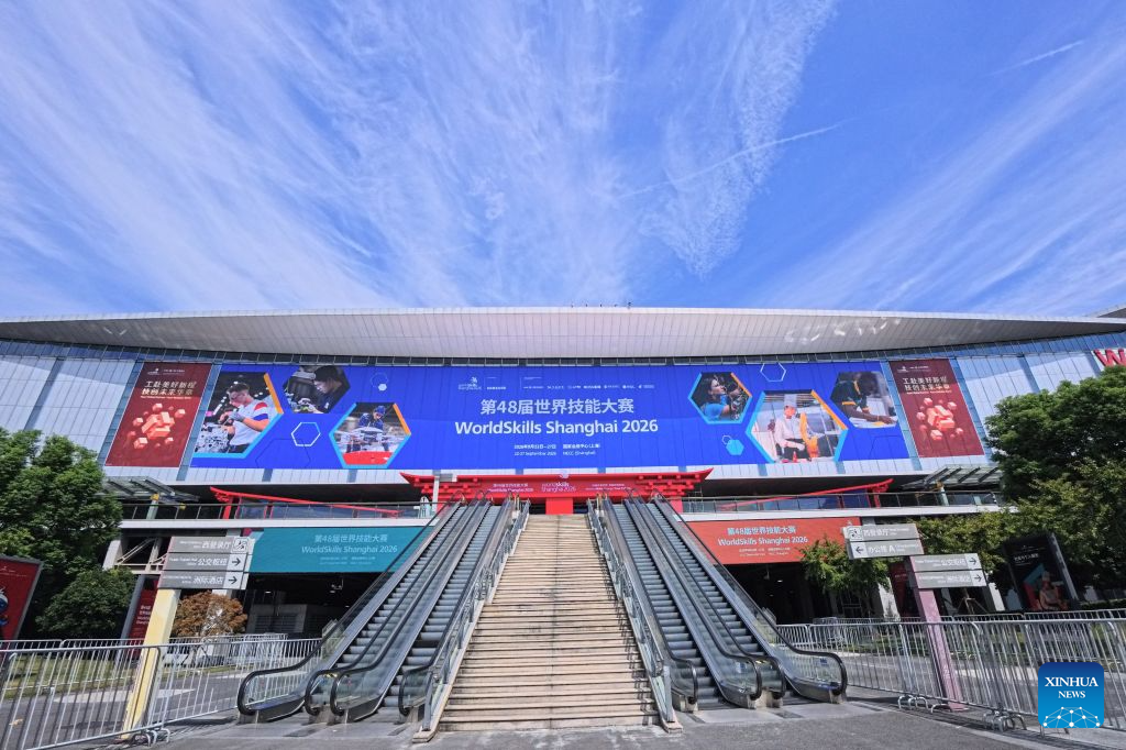 Decorations themed on the 48th WorldSkills Competition are seen at the west entrance of the National Exhibition and Convention Center (Shanghai) in east China's Shanghai, Sept. 15, 2026. The 48th WorldSkills Competition is scheduled to take place from September 22 to 27 in Shanghai. (Xinhua/Fang Zhe)