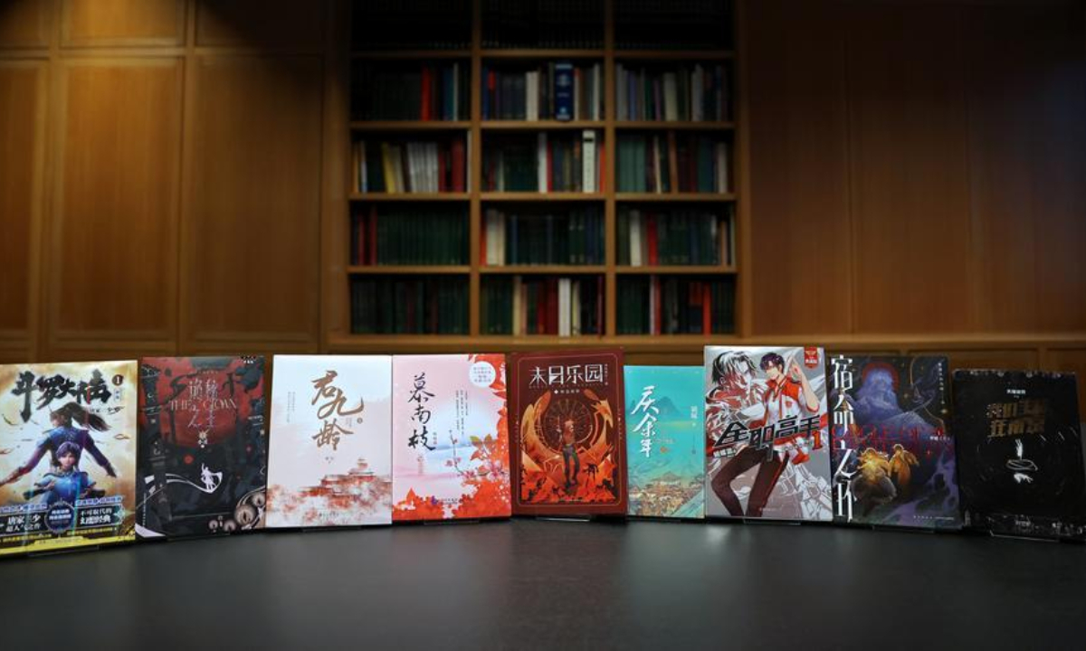 This photo taken on Nov. 21, 2024 shows some hard copies of online Chinese novels during their inclusion event at the British Library in London, Britain. (Xinhua/Li Ying)