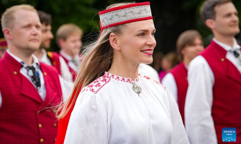 Participants in traditional costumes attend a parade of the Gaudeamus Baltic Student Song and Dance Festival in Riga, Latvia, June 21, 2026. Thousands of university students from Latvia, Lithuania, and Estonia gathered in the Latvian capital to participate in Gaudeamus, the milestone cultural event, celebrating youth and Baltic traditions. (Photo by Edijs Palens/Xinhua)