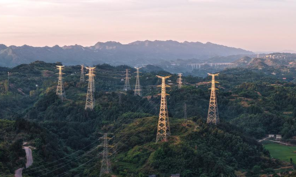 An aerial drone photo taken on July 30, 2026 shows outgoing lines of the Yubei converter station of the Hami-Chongqing ±800 kV ultra-high voltage direct current transmission project, in southwest China's Chongqing Municipality. (Xinhua/Huang Wei)