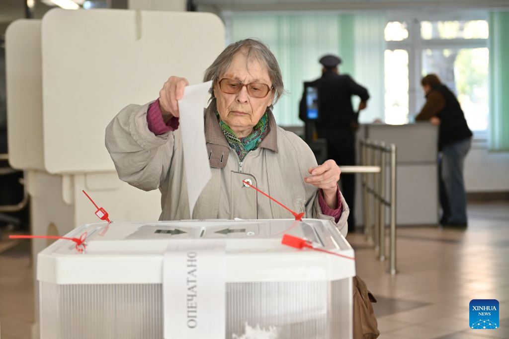 A voter casts her ballot at a polling station in Moscow, Russia, on Sept. 20, 2026. Elections for deputies to the ninth convocation of the State Duma, the lower house of parliament, ran from Sept. 18 to 20. (Photo by Alexander Zemlianichenko Jr/Xinhua)