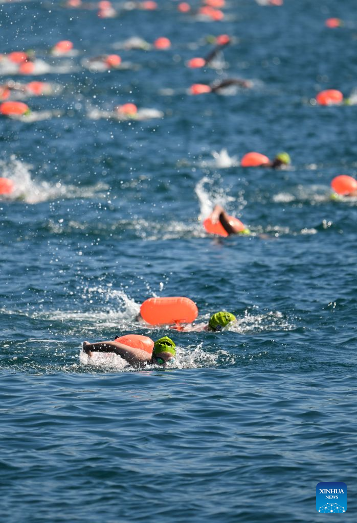 Swimmers compete during the 38th Bosphorus Cross-Continental Swimming Race in Istanbul, Türkiye, Aug. 23, 2026. (Xinhua/Liu Lei)