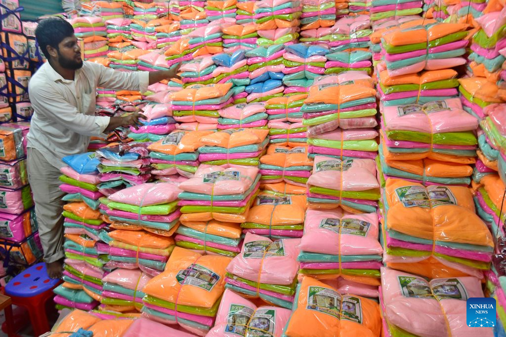 A seller works at a wholesale market for mosquito nets in Narayanganj, Bangladesh, on Sept. 14, 2026. Bangladesh has seen a rising demand for mosquito nets and other protective products amid an ongoing dengue outbreak. (Photo by Habibur Rahman/Xinhua)