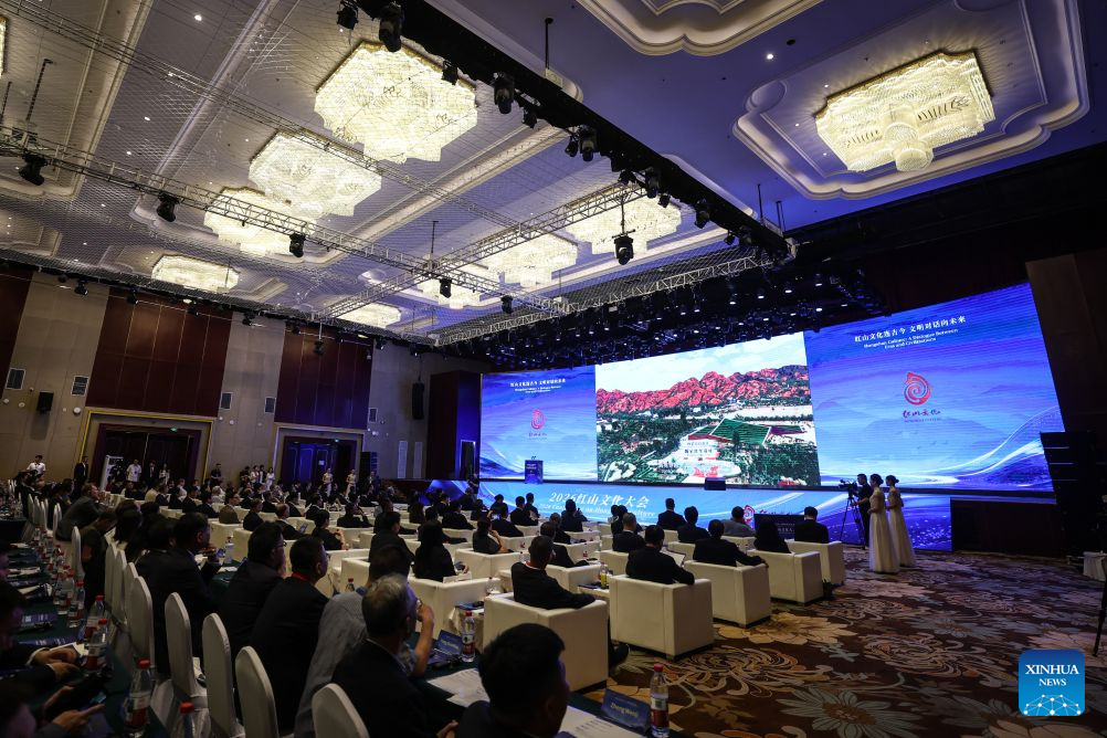 This photo taken on Aug. 5, 2026 shows a scene of the opening ceremony of the 2026 Conference on Hongshan Culture in Chaoyang City, northeast China's Liaoning Province. Themed on Hongshan Culture: A Dialogue Between Eras and Civilizations, the 2026 Conference on Hongshan Culture kicked off here on Wednesday. (Xinhua/Pan Yulong)