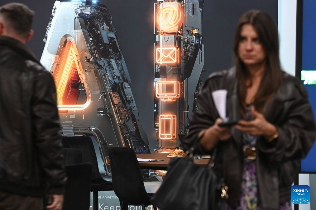 Visitors are seen at the World of AI and Big Data Expo in Warsaw, Poland, Sept. 22, 2026. Held from Sept. 22 to 24, the World of AI and Big Data Expo in Warsaw focuses on artificial intelligence, big data and related digital technologies, showcasing innovations in AI applications, data management, robotics and intelligent automation. (Photo by Aleksy Witwicki/Xinhua)