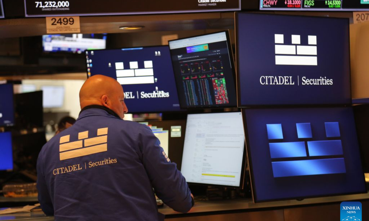 A trader works on the trading floor of the New York Stock Exchange in New York City, the United States, Oct. 7, 2026. U.S. stocks closed lower on Wednesday as benchmark Treasury yields touched multi-year highs. (Xinhua/Liu Yanan)