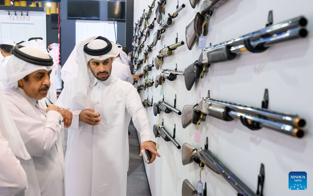 People look at hunting rifles at the gun section during the 10th Katara International Hunting and Falconry Exhibition, known as S'hail 2026, in Doha, Qatar, Sept. 8, 2026.

The event opened on Tuesday in Doha, bringing together 158 relevant companies and entities from 15 countries.

Running until Sept. 12, this year's edition features five main sections covering hunting weapons, falcon sales, equipment, off-road vehicle outfitting, and restaurants. Participants also include veterinary clinics, breeding farms, handicraft businesses, and safari and outdoor equipment companies. (Photo by Nikku/Xinhua)