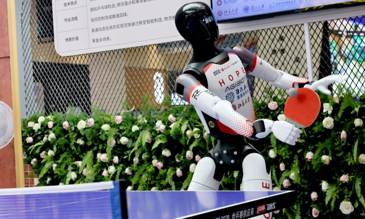 A robot plays table tennis during the 2026 World AI Conference and High-Level Meeting on Global AI Governance in Shanghai, east China, July 18, 2026. (Xinhua/Fang Zhe)