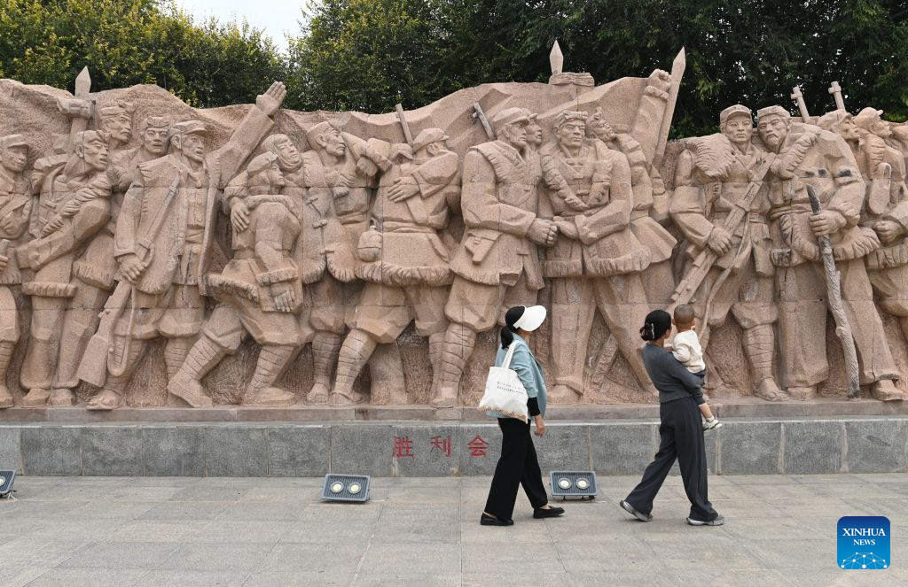 Tourists visit a memorial park marking the victory of the Central Red Army's Long March in Wuqi County of Yan'an City, northwest China's Shaanxi Province, Sept. 26, 2026. This year marks the 90th anniversary of the victory of the Long March. (Photo by Qi Xiaojun/Xinhua)