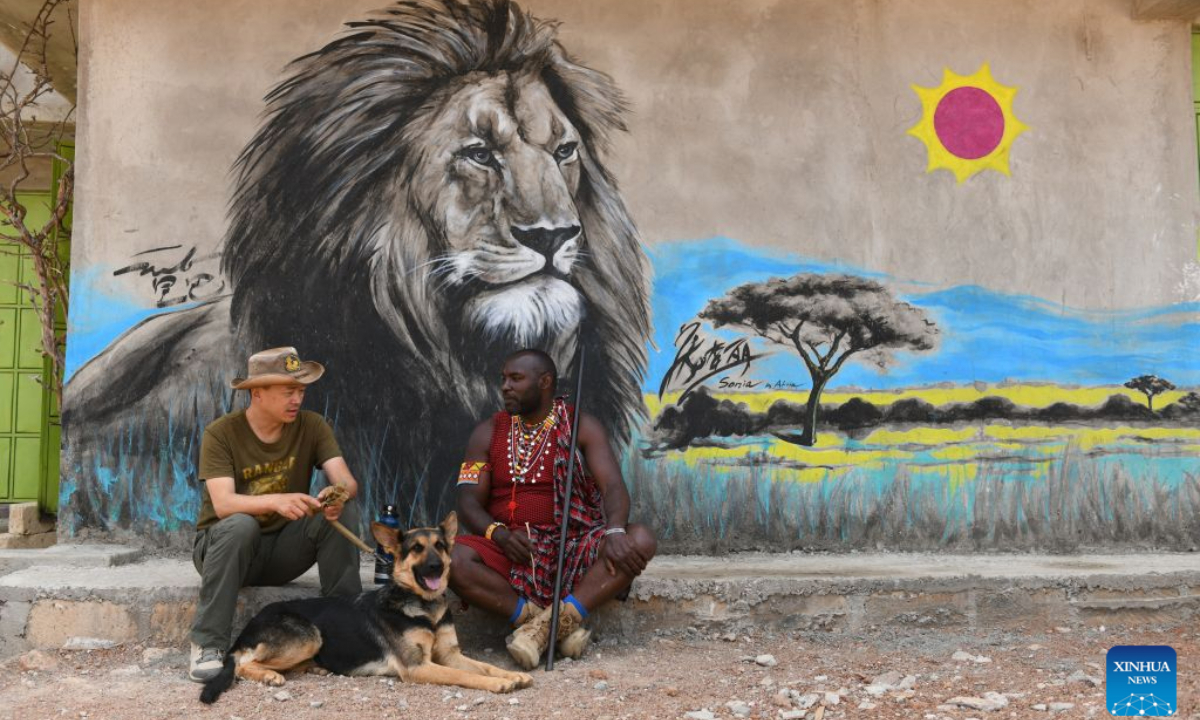 Zhuo Qiang (L) talks with Simon Msago, a Maasai community leader in Ngoswani, in Narok, Kenya, Aug. 12, 2026. (Xinhua/Liu Qiong)