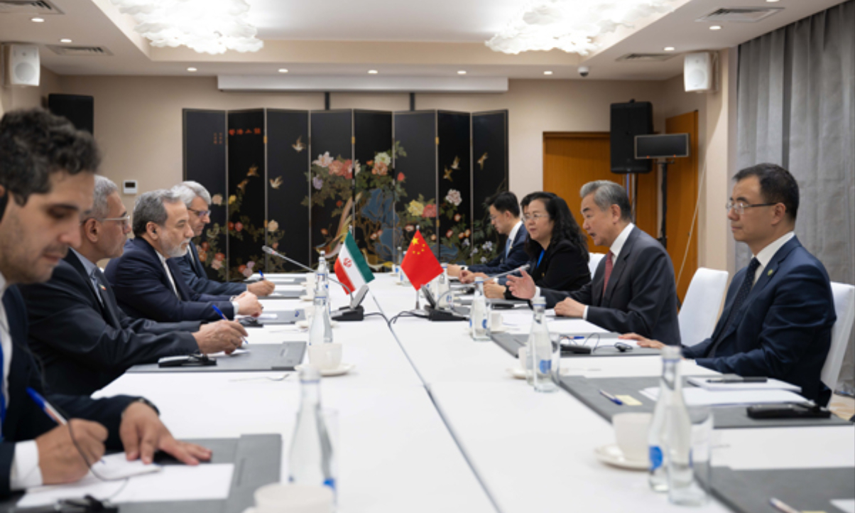 Chinese Foreign Minister Wang Yi, also a member of the Political Bureau of the Communist Party of China Central Committee, meets with Iranian Foreign Minister Seyed Abbas Araghchi on the sidelines of the Meeting of the Council of the Ministers of Foreign Affairs of the Shanghai Cooperation Organization (SCO) Member States in Kyrgyzstan on July 24, 2026. Photo: Chinese Foreign Ministry