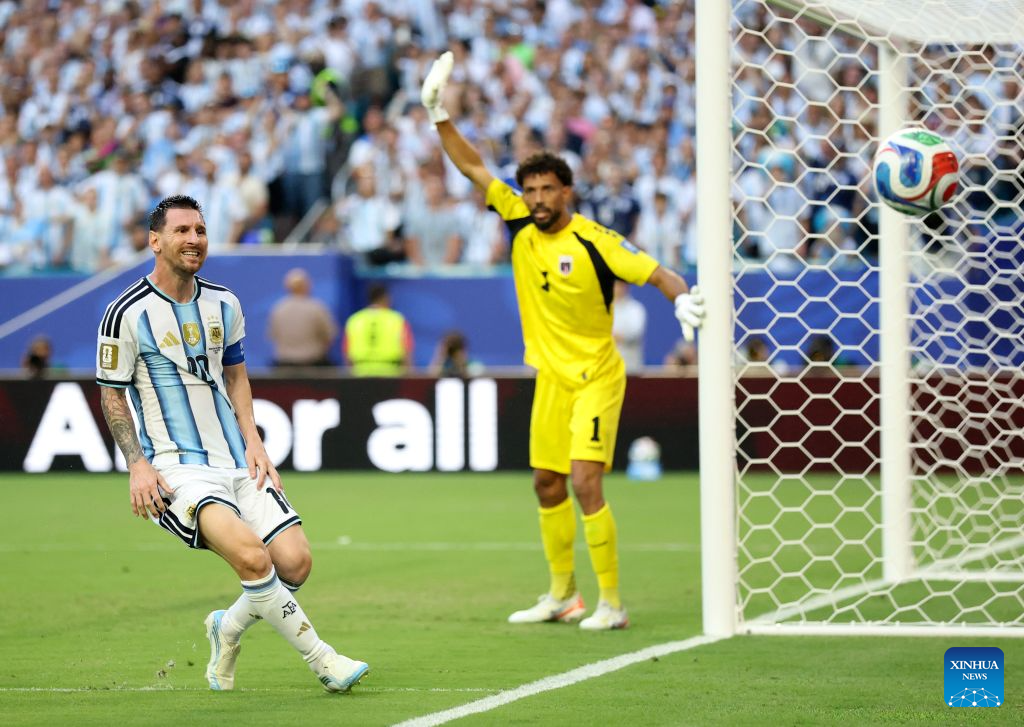 Lionel Messi (L) of Argentina and Cabo Verde's goalkeeper Vozinha compete during the round of 32 match between Argentina and Cabo Verde at the 2026 FIFA World Cup at Miami Stadium, Miami, the United States, July 3, 2026. (Xinhua/Zhang Chen)
