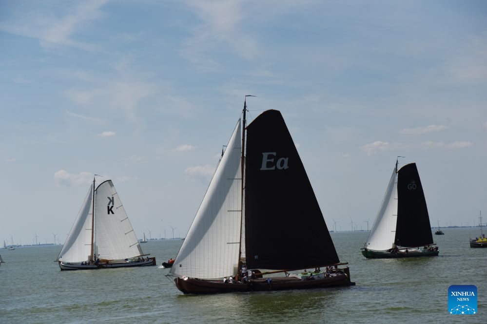 Boats compete during the 2026 Open Frisian Championships (IFKS) in Stavoren, the Netherlands, on Aug. 2, 2026. (Xinhua/Shao Haijun)