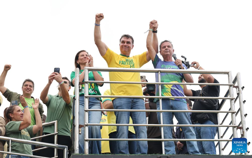 Brazilian Senator Flavio Bolsonaro (front C), presidential candidate of Brazil's Liberal Party, attends his first presidential campaign rally in Rio de Janeiro, Brazil, Aug. 16, 2026. (Xinhua/Jin Haoyuan)