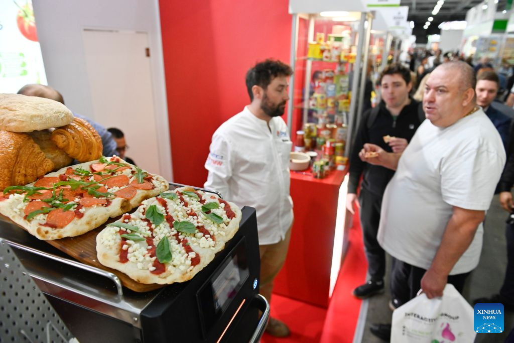 Visitors taste food at the 35th WorldFood Expo in Moscow, Russia, on Sept. 15, 2026. The 35th WorldFood Expo kicked off here on Tuesday with the participation of more than 1,000 exhibitors. The event will run until Sept. 18. (Xinhua/Alexander Zemlianichenko Jr)