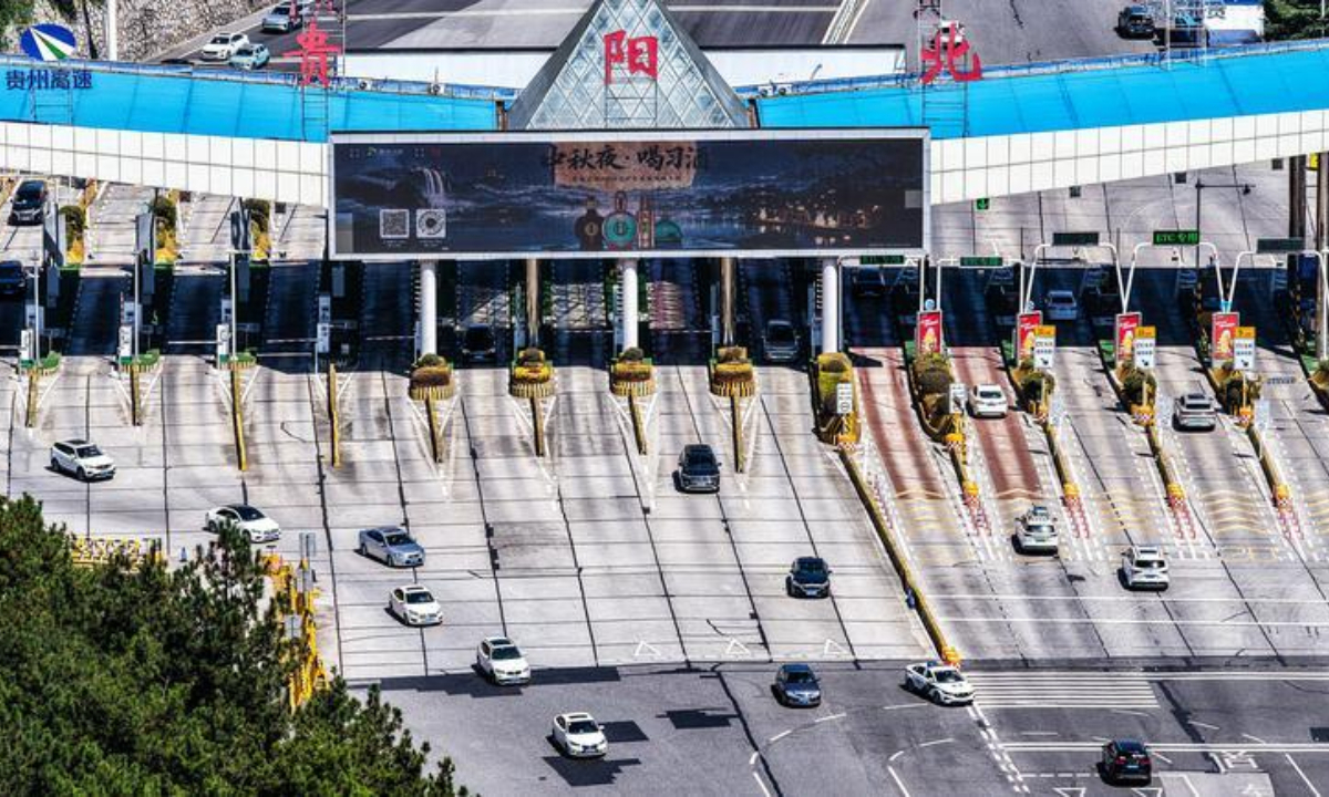 An aerial drone photo taken on Oct. 7, 2026 shows vehicles passing the Guiyang North toll gate in Guiyang, southwest China's Guizhou Province. (Xinhua/Tao Liang)
