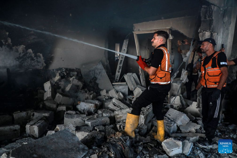 A Palestinian extinguishes fire in a destroyed residential apartment following an Israeli airstrike in Gaza City, Sept. 8, 2026. (Photo by Rizek Abdeljawad/Xinhua)