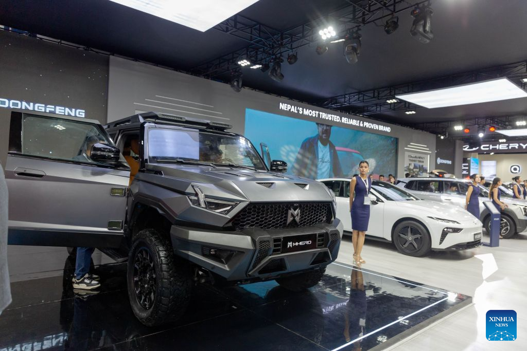 A vehicle is pictured at the booth of Chinese automaker Dongfeng during the 18th NADA Auto Show in Kathmandu, Nepal, Aug. 25, 2026. Nepal's 18th NADA Auto Show kicked off here on Tuesday, bringing together more than 50 vehicle brands. Organized by the NADA Automobiles Association of Nepal, the five-day exhibition features around 200 stalls displaying four-wheelers, two-wheelers, auto parts and related services. (Photo by Sulav Shrestha/Xinhua)