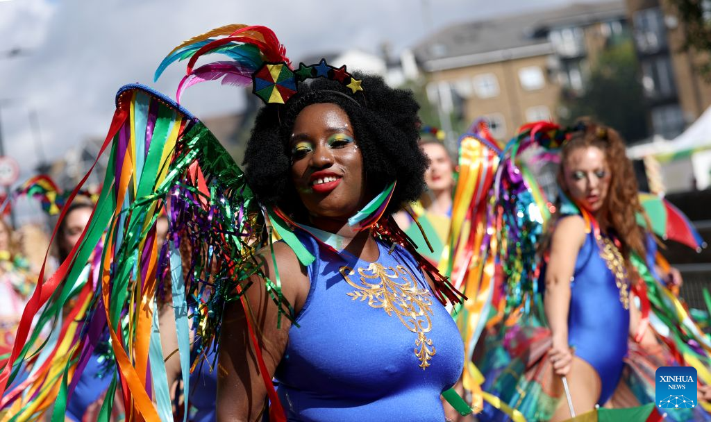 Performers participate in the Notting Hill Carnival in London, Britain, on Aug. 31, 2026. Originating in the 1960s, the carnival is a way for Afro-Caribbean communities to celebrate their cultures and traditions. (Xinhua/Li Ying)