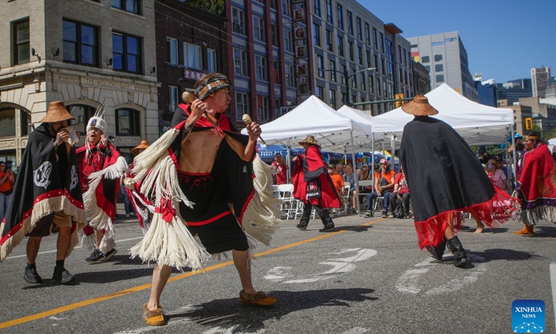 Indigenous dancers perform during a National Indigenous Peoples Day event in Vancouver, British Columbia, Canada, June 21, 2026. (Photo by Liang Sen/Xinhua)