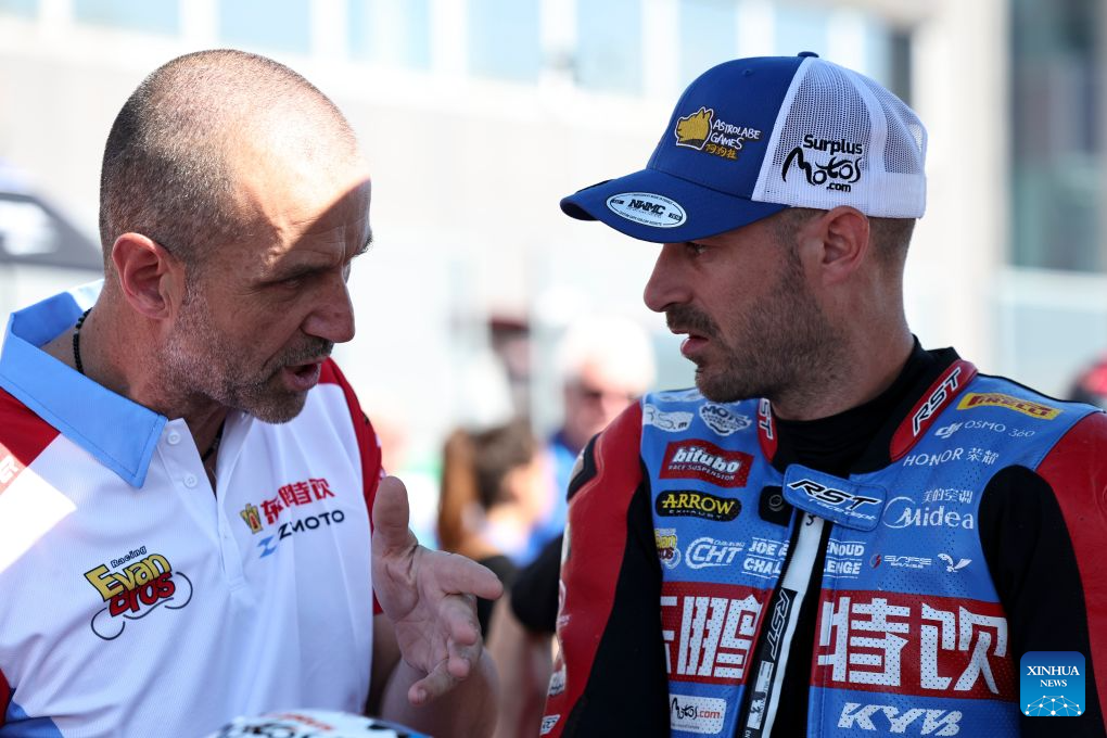 Valentin Debise (R) of EASTROC ZXMOTO Evan Bros Factory reacts before the Race 2 of WorldSSP at the FIM Supersport World Championship Italian Round Cremona Circuit, Italy, Sept. 27, 2026. (Xinhua/Li Jing)