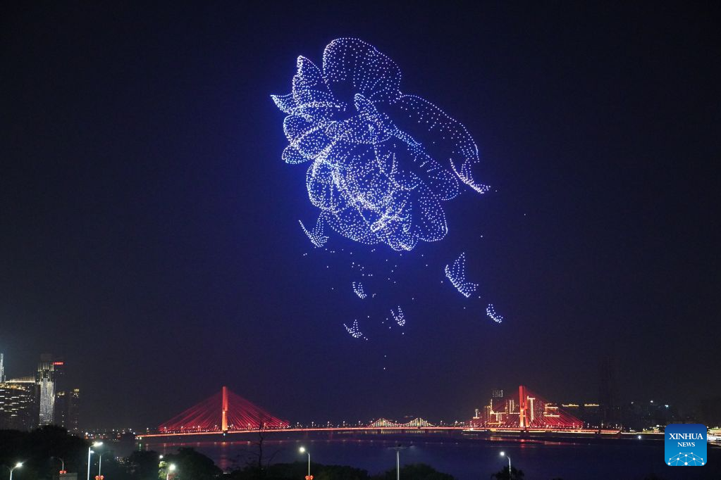 A drone show is staged over a square along Ganjiang River in Nanchang, east China's Jiangxi Province, Sept. 12, 2026. (Xinhua/Zhou Mi)