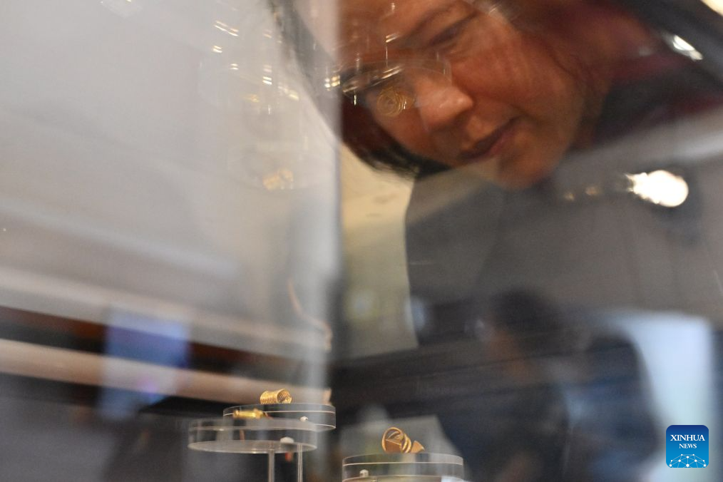 A woman looks at exhibits at Phra Nakhon Khiri National Museum in Phetchaburi Province, Thailand, on Aug. 25, 2026. The ongoing special exhibition Don Yai Thong: The Prologue to Phetchaburi Civilization at the Phra Nakhon Khiri National Museum in Phetchaburi Province runs from Aug. 24 to 28. The exhibition features important artifacts excavated from the Don Yai Thong archaeological site, including bronze objects, potteries, beads, gold ornaments, and a gold ring inscribed with Brahmi script dating back approximately 1,900 to 2,100 years. (Xinhua/Rachen Sageamsak)