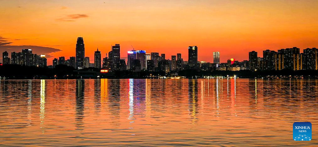This photo taken with a mobile phone on Sept. 5, 2026 shows the East Lake scenic area at sunset in Wuhan, central China's Hubei Province. (Xinhua/Shen Hongbing)
