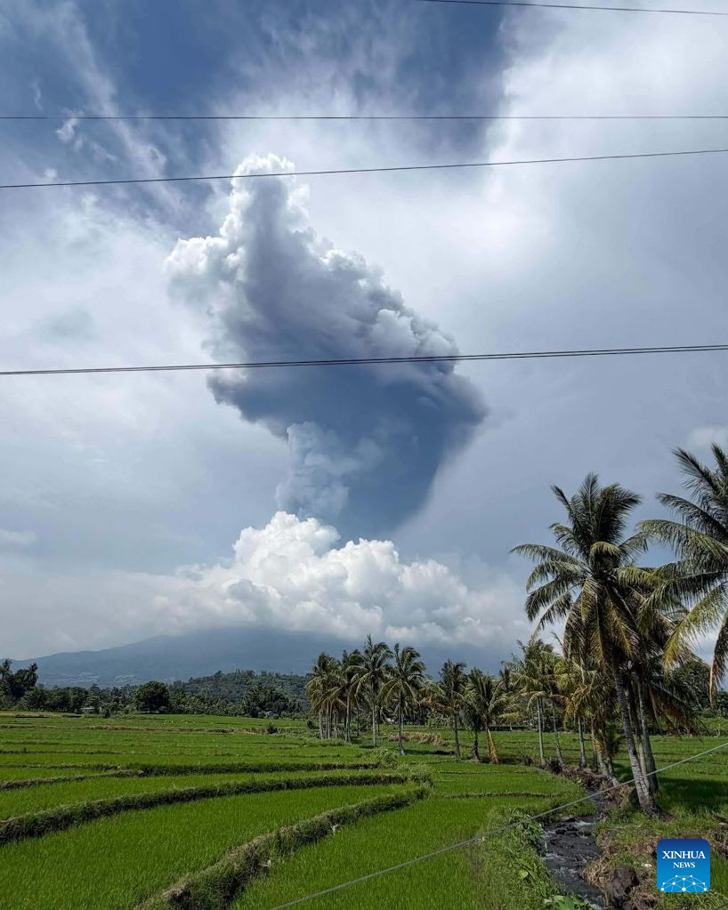 A thick plume is seen over the sky as Mount Kanlaon Volcano erupts in Negros Island, the Philippines, on Oct. 10, 2026. Mount Kanlaon Volcano in the central Philippines erupted just over noon Saturday, the Philippine Institute of Volcanology and Seismology said. The institute said the event generated a plume that rose 5 km to 6 km above the crater. The ashfall is expected to drift north and northeast. (National Disaster Risk Reduction and Management Council/Handout via Xinhua)